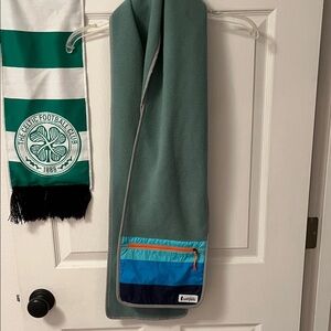 Cotopaxi Blue and Orange Fleece scarf with Zip Pocket